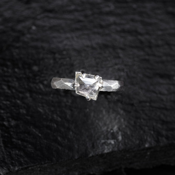 silver engagement ring with a crystal