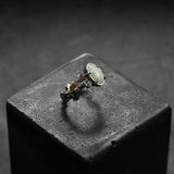 Exceptional ring, unique piece made to measure, in aged red gold with a white opal from Australia. Contemporary design.