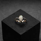 Exceptional ring, unique piece made to measure, in aged red gold with a white opal from Australia. Contemporary design.