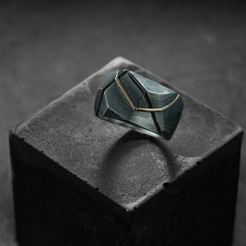 Massive faceted signet ring for men in black silver and silver, contemporary design.