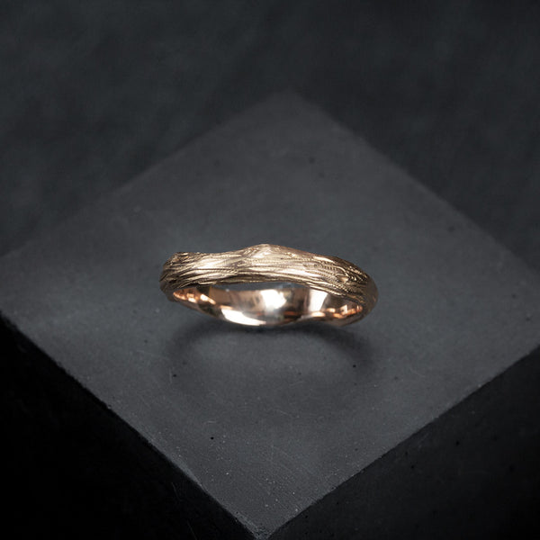 TEXTURED RED GOLD WEDDING BAND