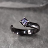 solitaire ring in black gold with square mauve spinel