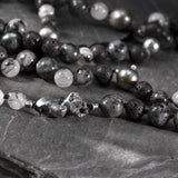 long necklace in tahitian pearls, lava, quartz and silver 