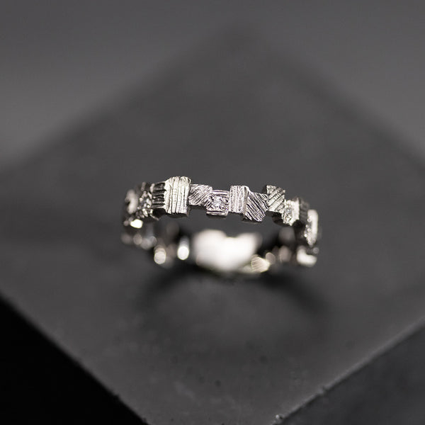 contemporary graphic wedding ring in white gold with white diamonds