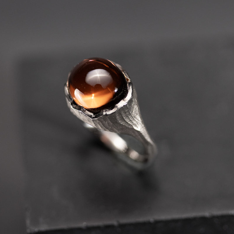 unique ring, made to measure, in white gold and orange tourmaline
