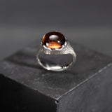 unique ring, made to measure, in white gold and orange tourmaline