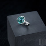 925 silver Legion Paris ring with an indicoite tourmaline cabochon and 2 grey diamonds and textured ring body