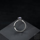side view of a contemporary Legion Paris ring in white gold 750 set with a square purple spinel