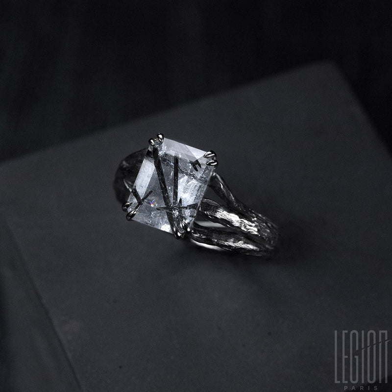 750 white gold Legion Paris engagement ring with a quartz center stone with tourmaline inclusions