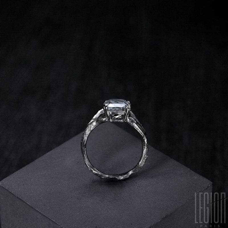 side view of a Legion Paris engagement ring with a textured 750 white gold ring body. 