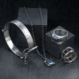 black silver jewellery set with blue and brown stones