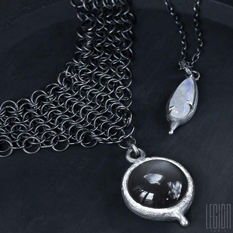 black silver necklaces with white and black stones