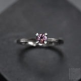 Solitaire ring in white gold with a round pink tourmaline