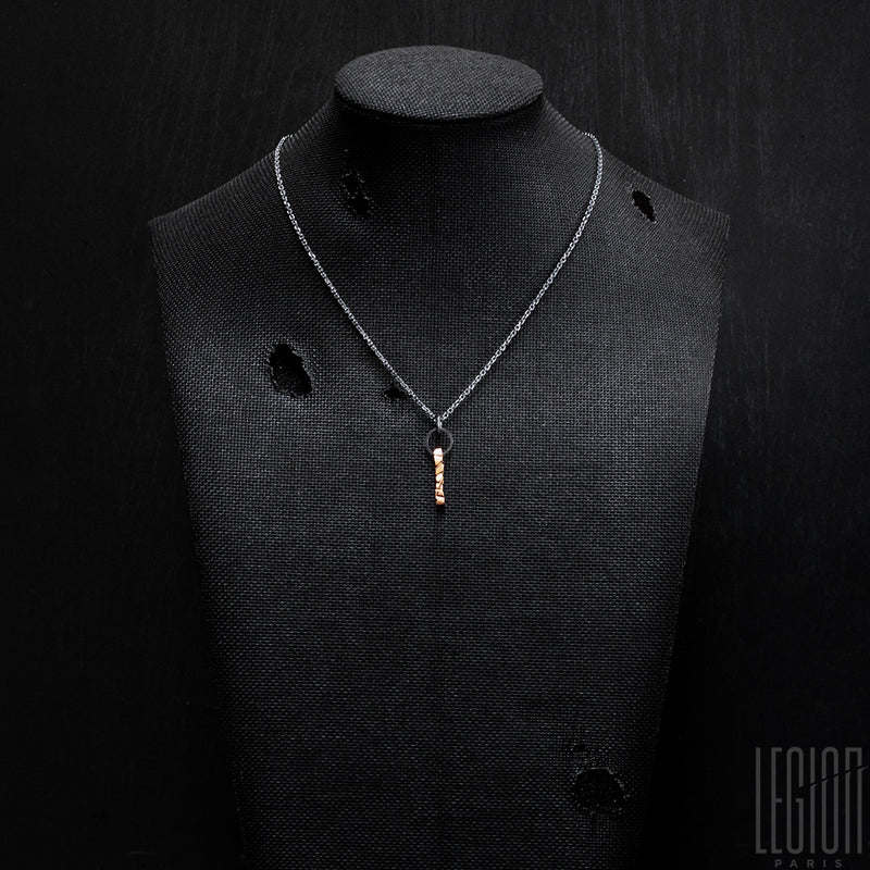 red gold pendant and black silver chain