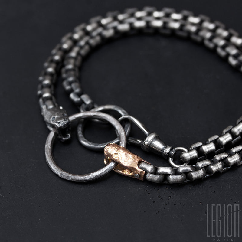 bracelet double turns in black silver and red gold, venitian chain and two snake heads. 